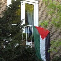 Vrouw Duisenberg vlagt voor Jassar Arafat