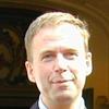 Secretaris Nationaal Oranje Comité in opspraak
