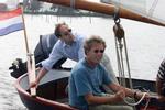 Optimisme na lezing rapport-Koning